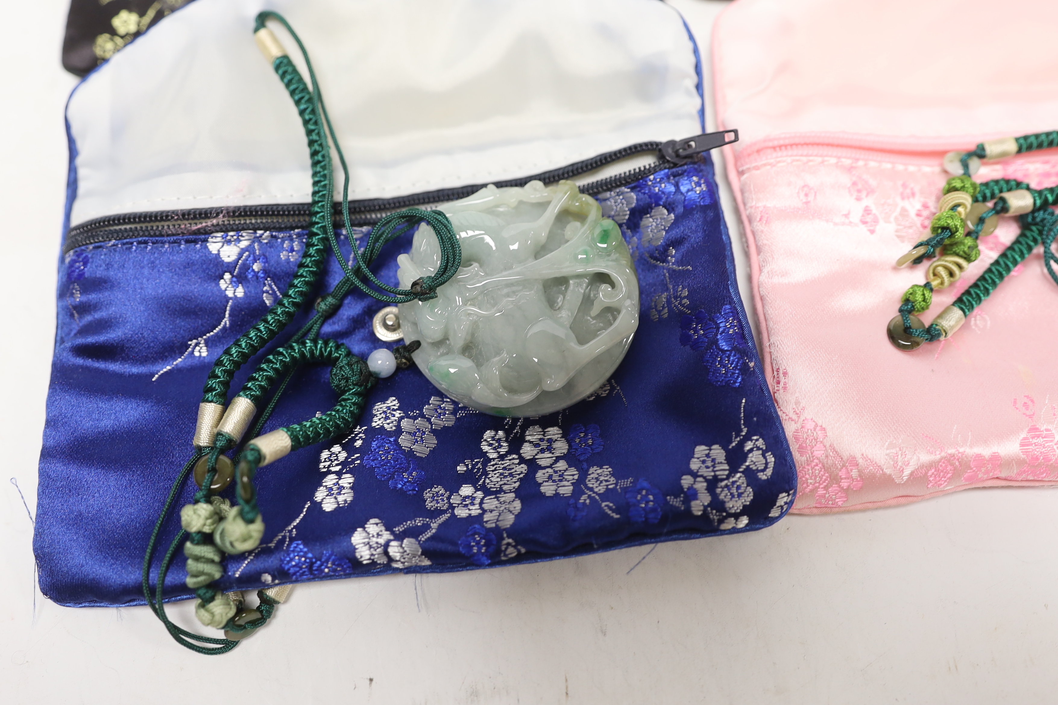 Four Chinese jadeite pendants